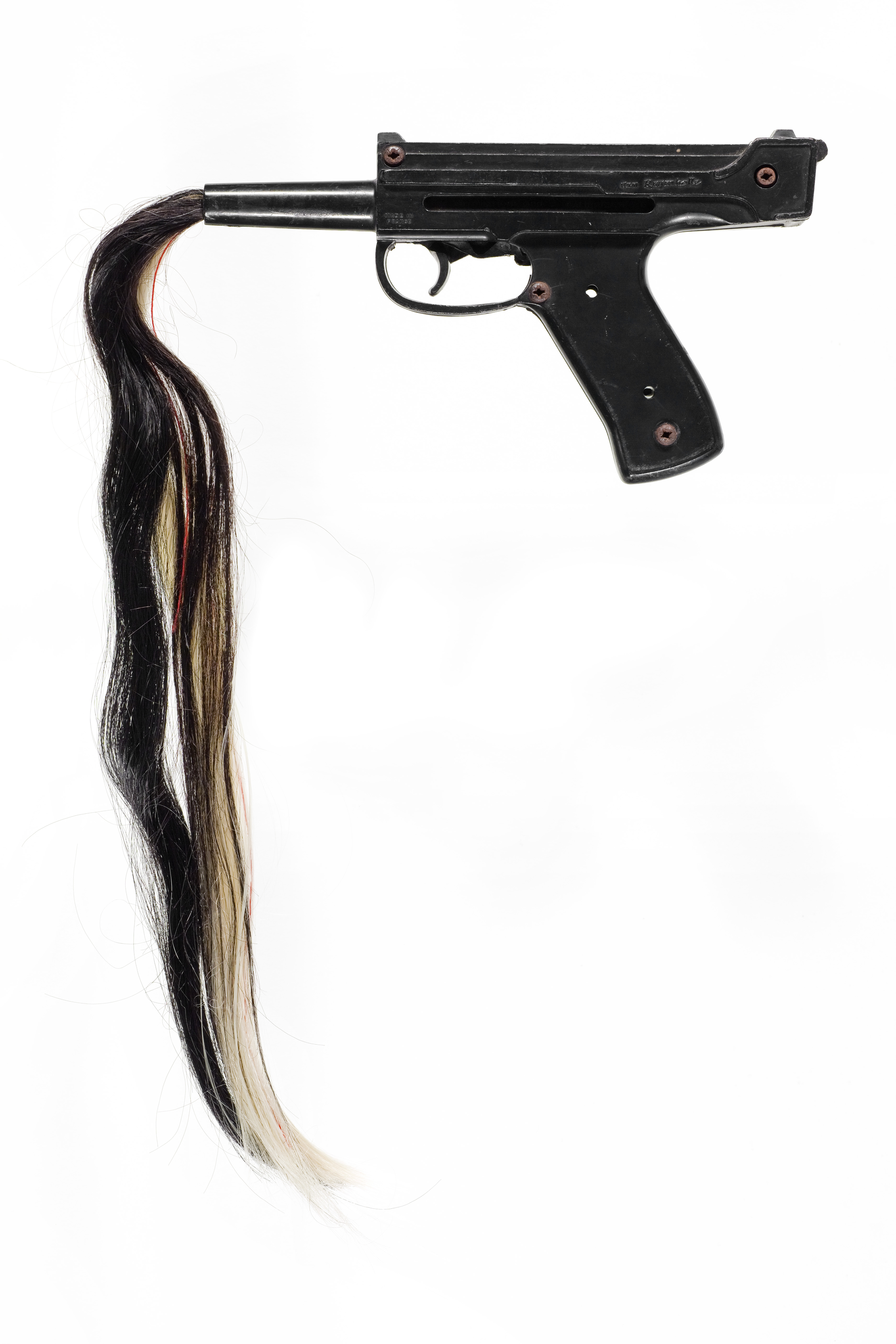 Olga Cironis, Playing War With Daddy, 2015, toy gun, hair, thread, 40 x 30 x 2cm