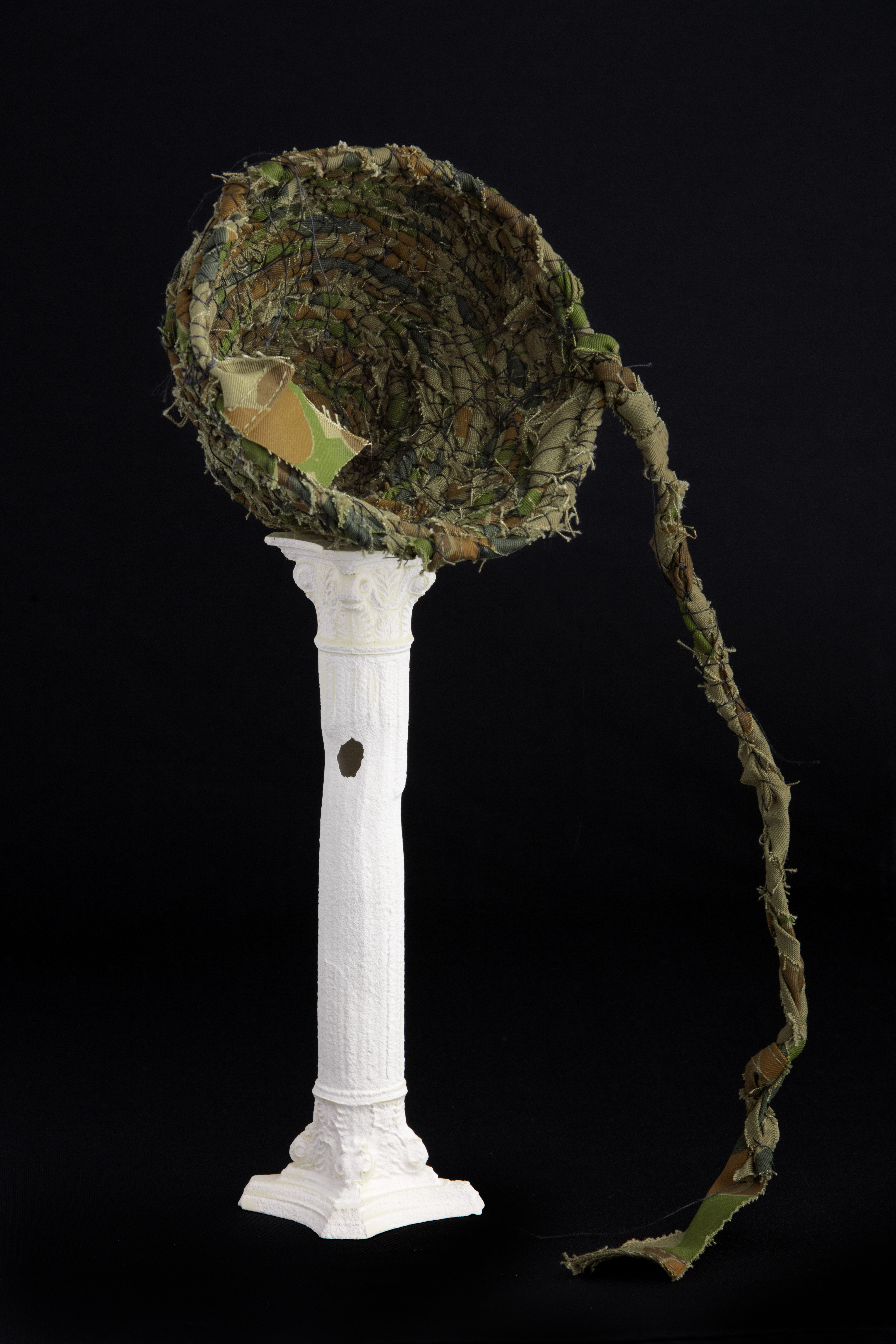 Olga Cironis, Wishing for Some Understanding, 2016, recycled domestic ornament, camo fabric and thread, 30 x 15 x 15cm