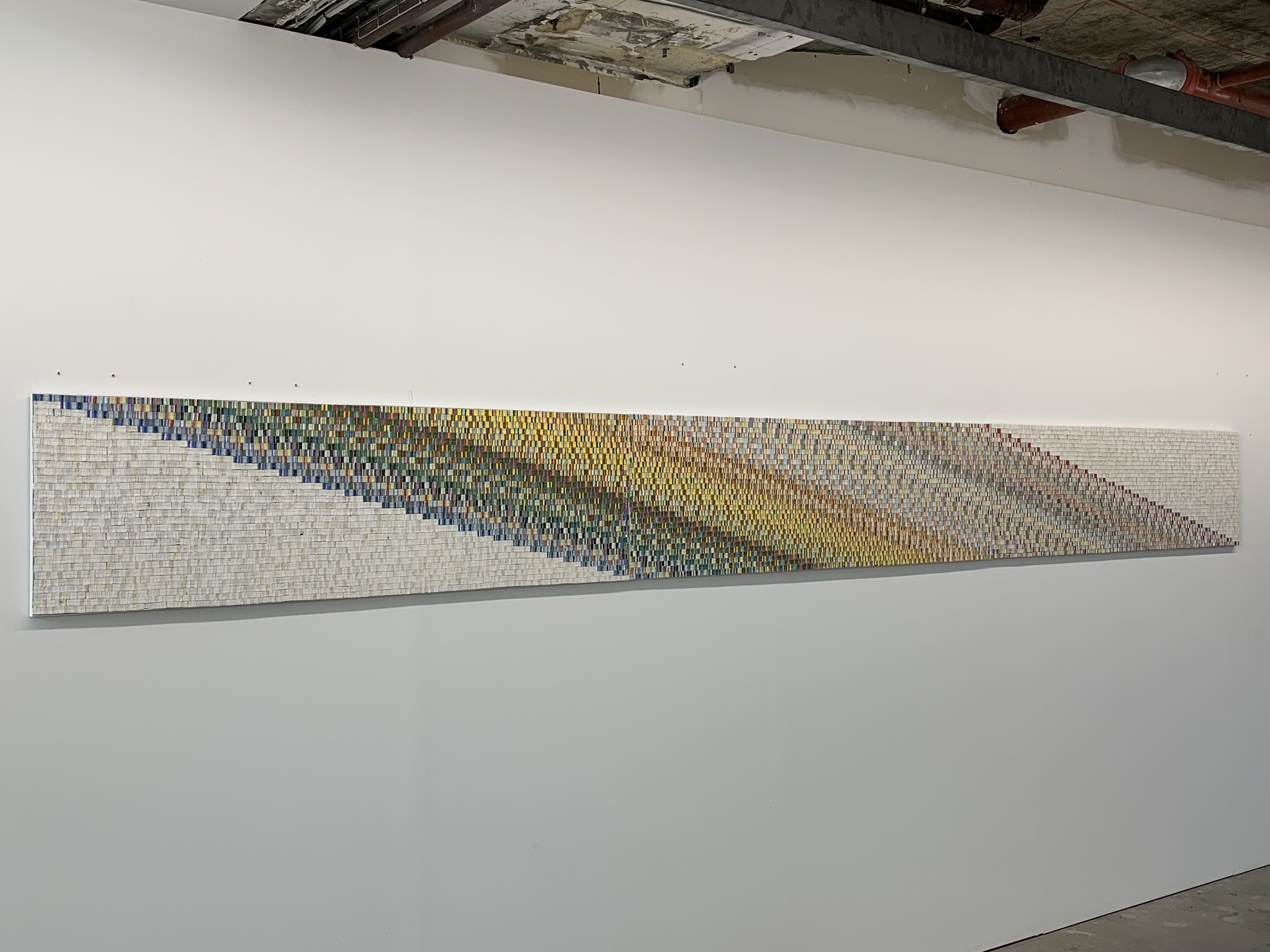 Eveline Kotai, Space Shift, 2019, acrylic, nylon thread on canvas, 46 x 152.5cm. Murdoch University Art Collection