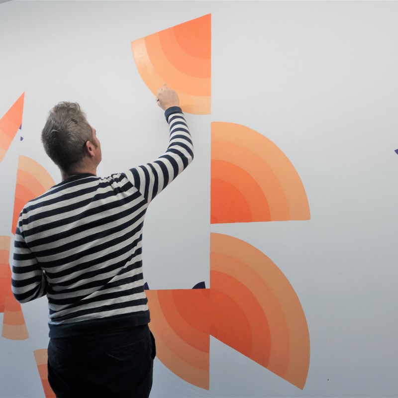 Ham Darroch creating wall work at Art Collective WA