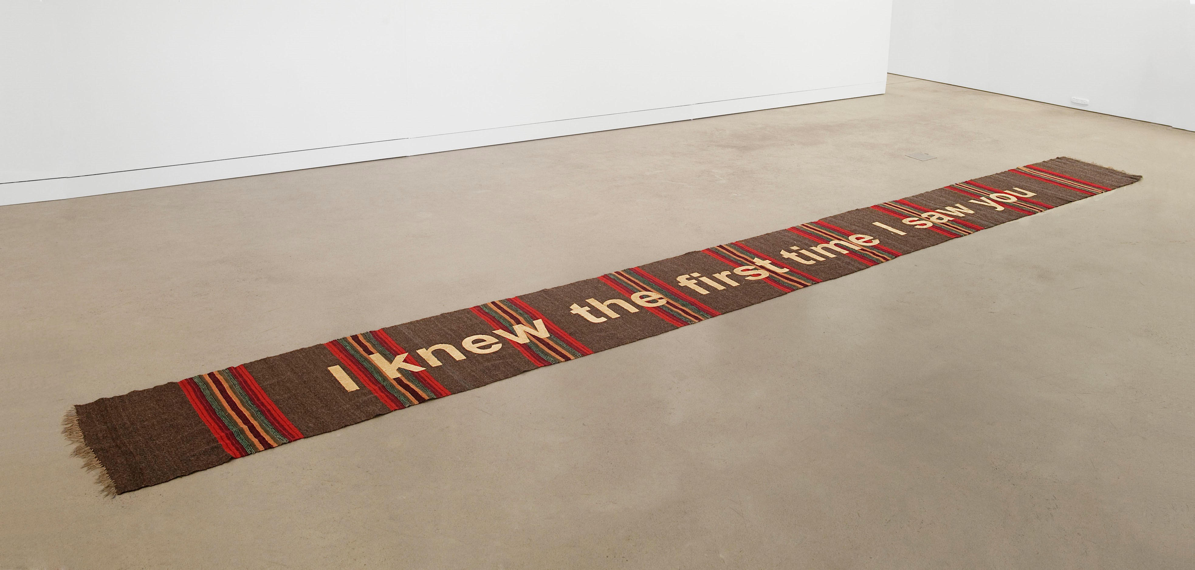 Olga Cironis, I Knew the First Time I Saw You, 2013, recycled Greek domestic rug and gold leaf, 550 x 40cm