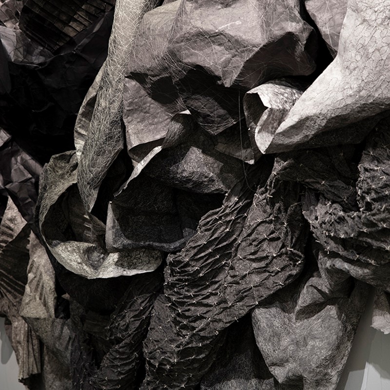 (Un) fold (detail), 2019, Canson paper, ink, thread, and polish, dimensions variable