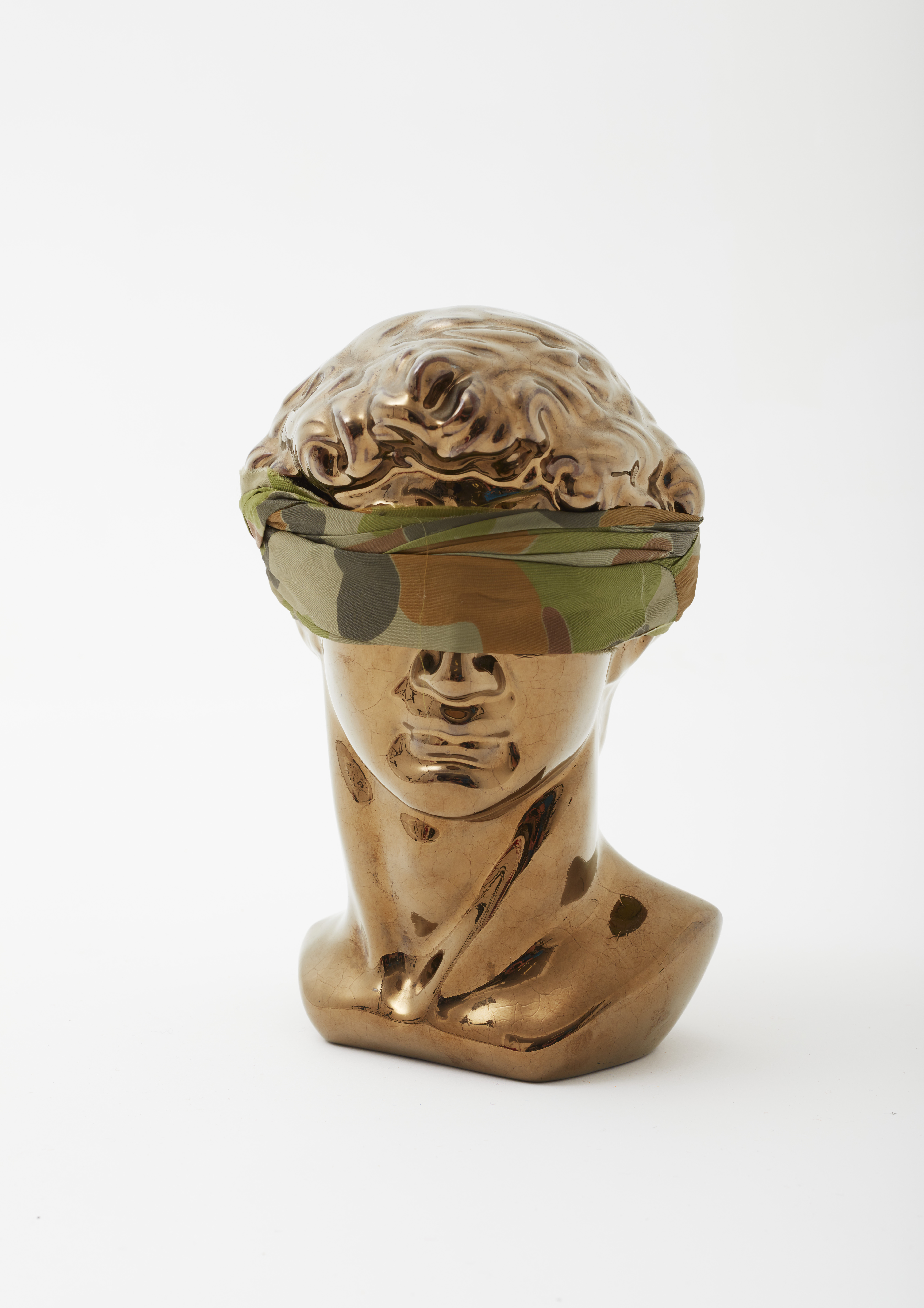 Olga Cironis, Seeing is Believing, 2014, repurposed ceramic ornament and military fabric, 27 x 20 x 18cm