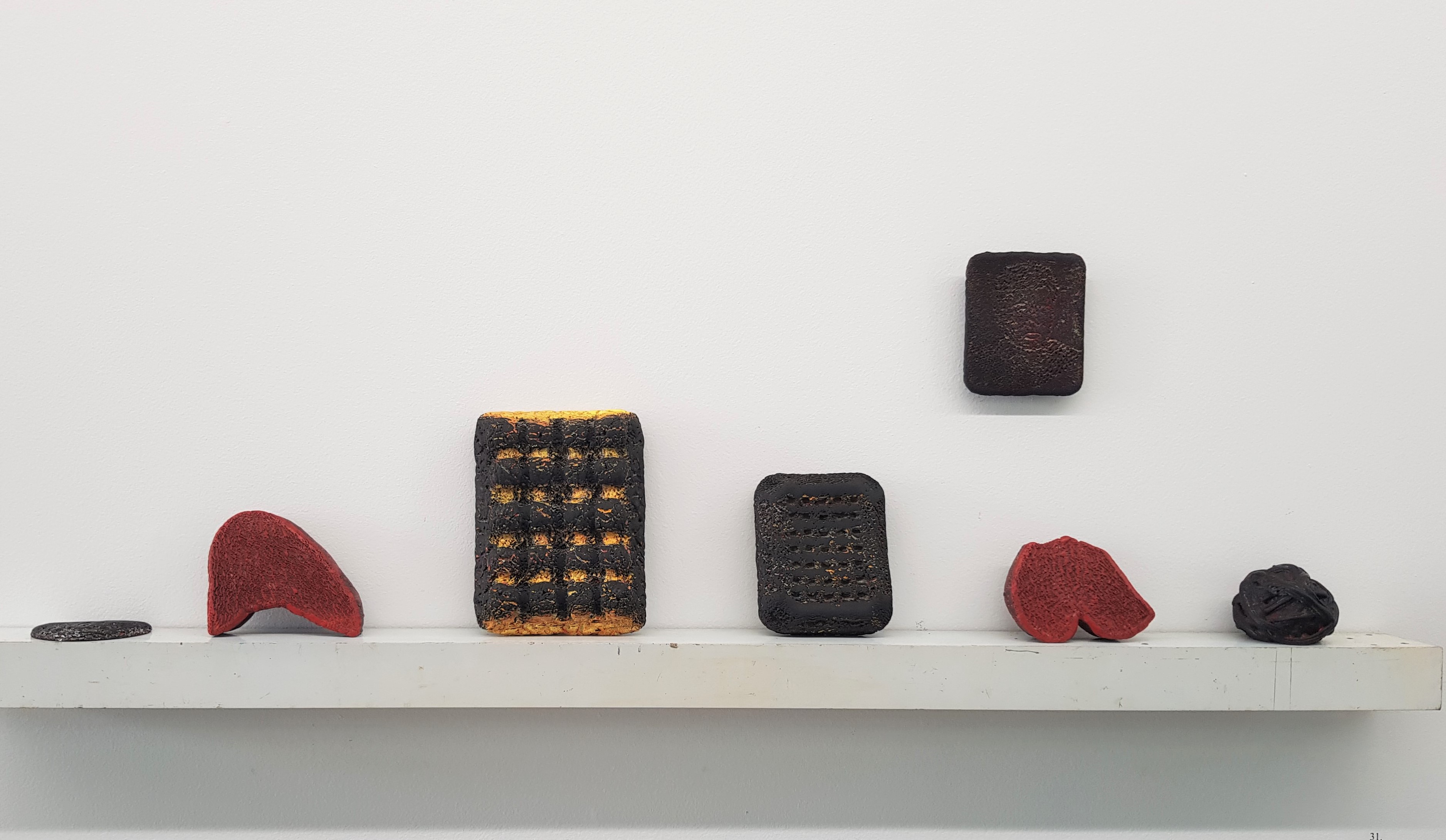 Andre Lipscombe, Clearing Station, 2018-20, acrylic paint, cypress pine, board, anodised aluminium and brass, 24.4  x 116 x 8cm (9 installed components)