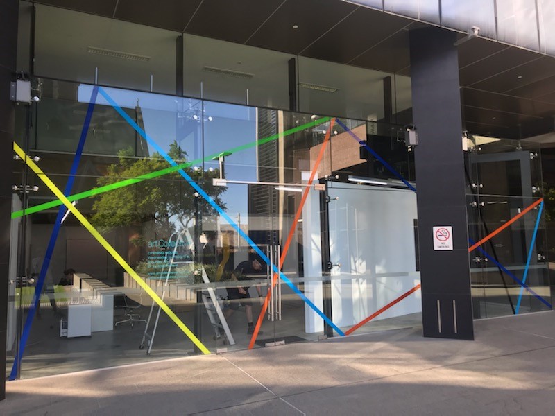 Trevor Richards, C-Change installation, vinyl tape on glass, Cathedral Square 2021