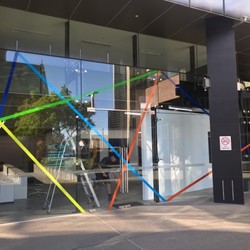 Trevor Richards, C-Change installation, vinyl tape on glass, Cathedral Square 2021