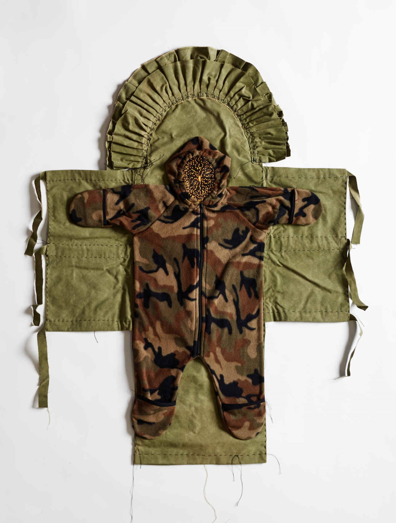 Olga Cironis, Hollow Desires, child’s clothing, hair and cotton thread on military canvas, 111 x 83cm