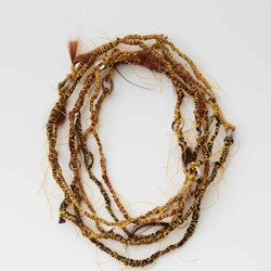 Olga Cironis, Persephone’s Rope 2020, hair, cotton thread and donated rings, 400 × 1cm