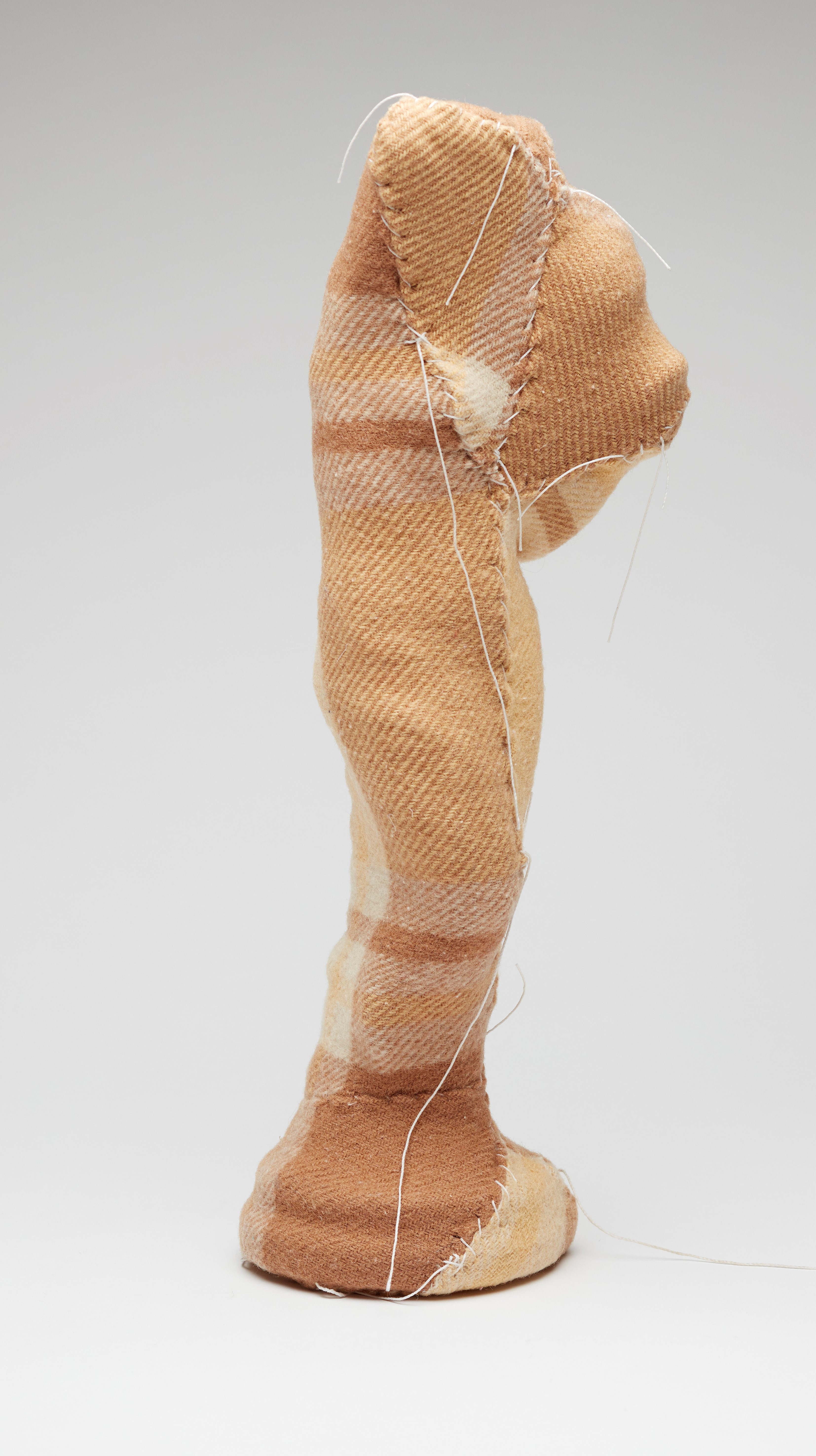 Olga Cironis, Water Bearer, 2013, ceramic ornament, woollen blanket and cotton thread, 40 x 13 x 10.5cm