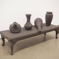 Olga Cironis, Home Grown, 2013, repurposed ceramic ornaments, wooden furniture and woollen blankets, 60 x 110 x 40cm