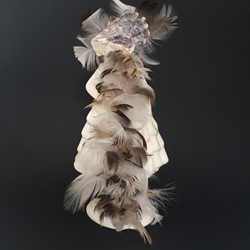 Olga Cironis, Lines that Define, repurposed porcelain ornament, shell and feathers