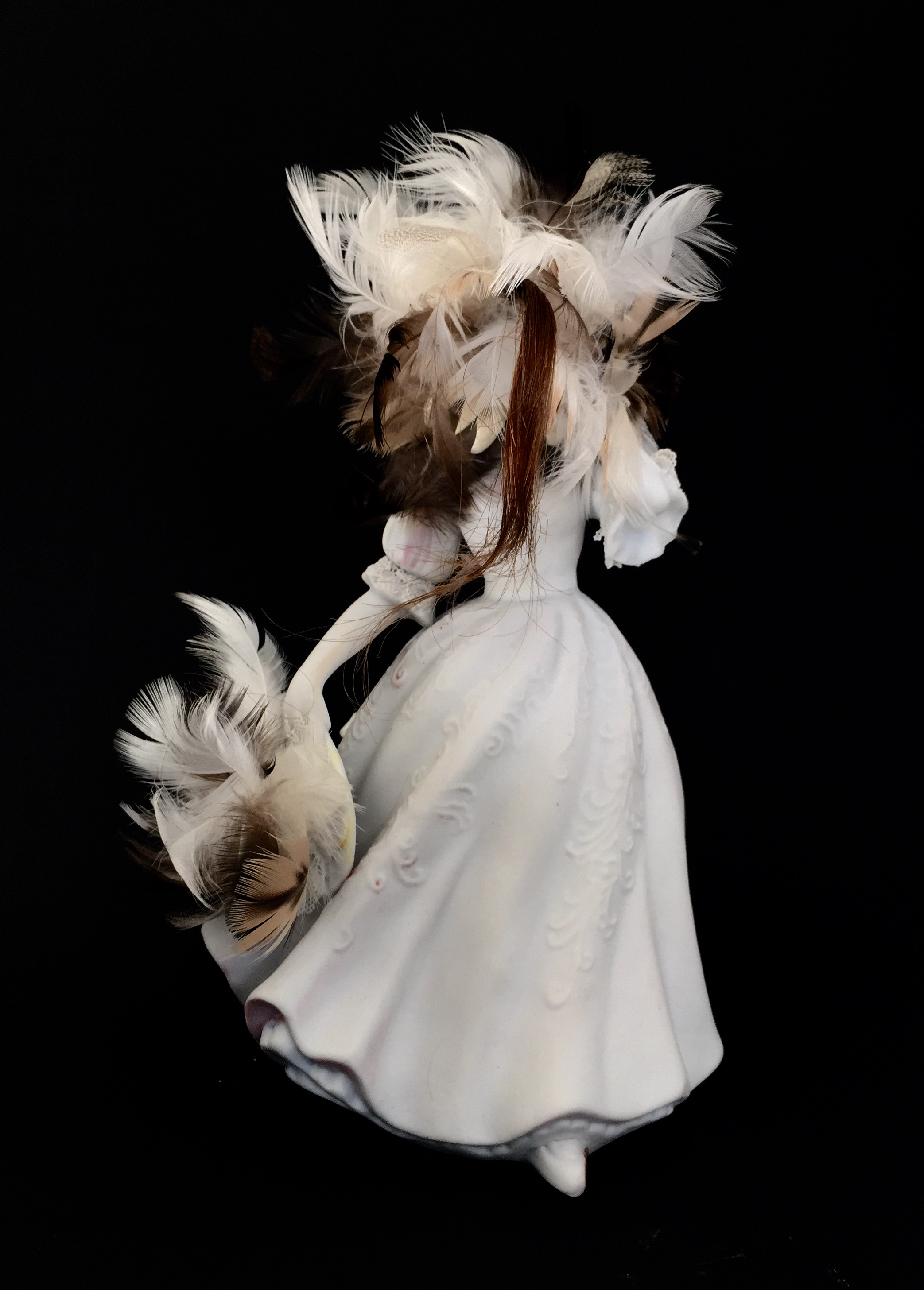 Olga Cironis, Lines that Define, repurposed porcelain ornament and feathers
