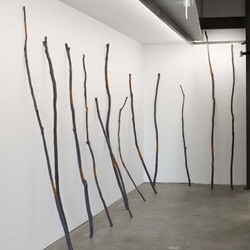 Olga Cironis, Drawn by a Promise, 2021, wooden sticks, woollen blanket and cotton thread, installation dimensions variable
