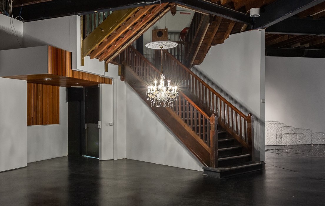 Nicholas Folland, It Had to be You ..., 2020, chandelier, refrigeration unit, 12V lighting and ceiling rose, dimensions variable. Photo Christo Crocker, installation view Margaret Lawrence Gallery Melbourne