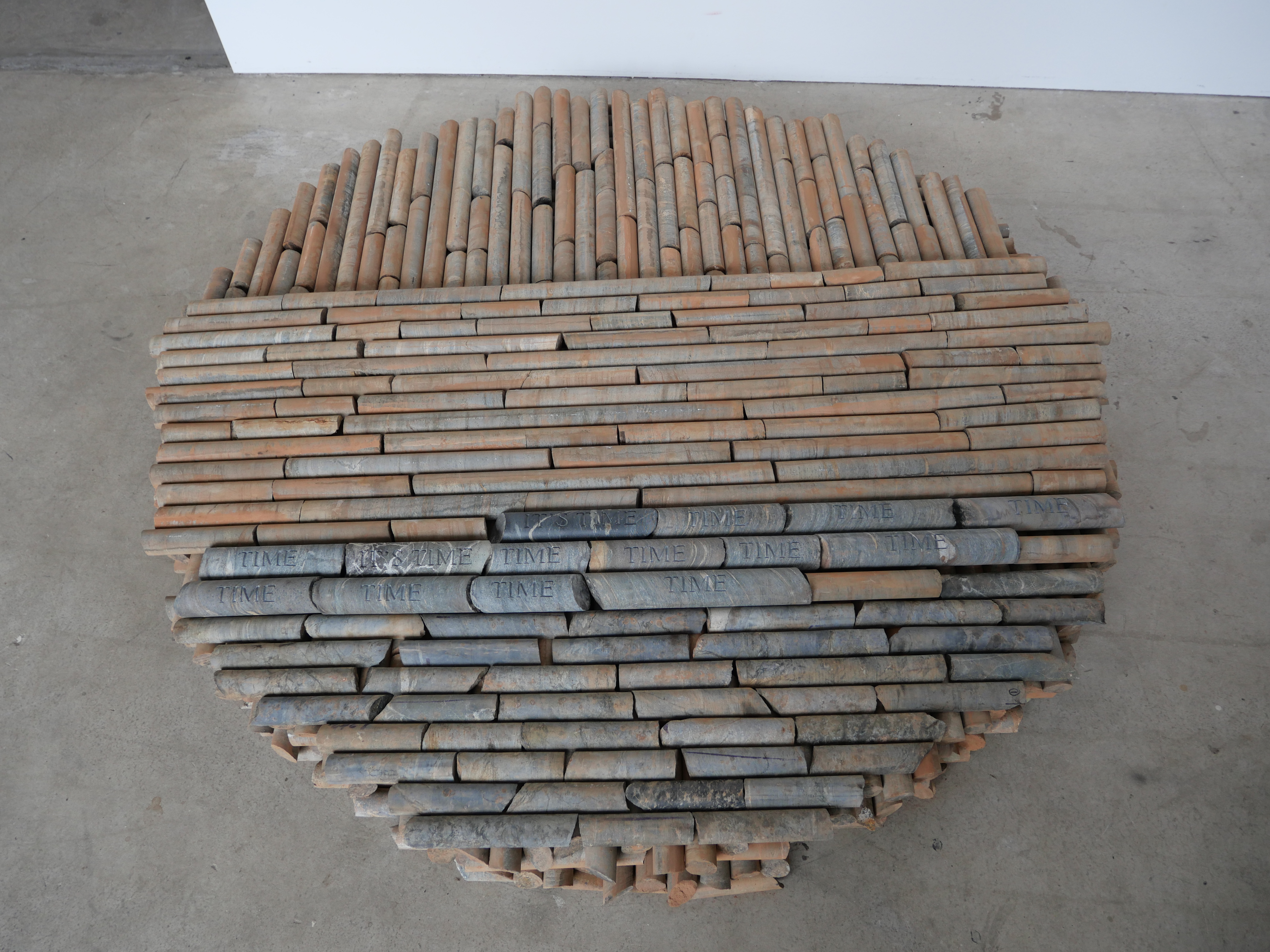 Lee Harrop, Heap of Time, 2021, blank and hand-engraved core samples, dimensions variable