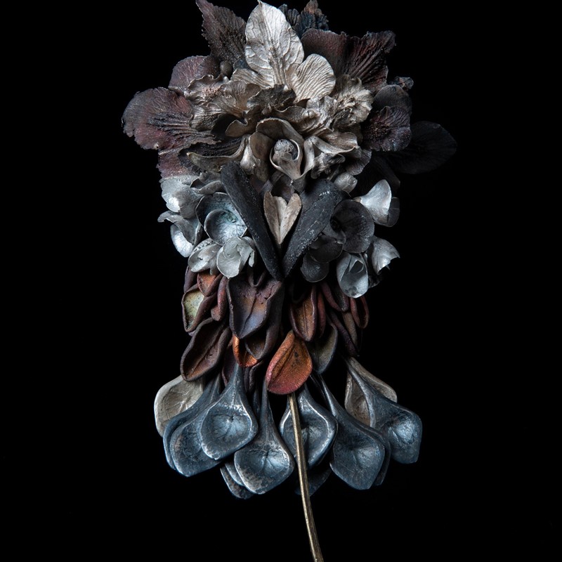 Fuck Cluster Brooch, 2021, gum leaves, banksia seed pod, orchid tongues, crown of thorns flowers, salt bush leaves