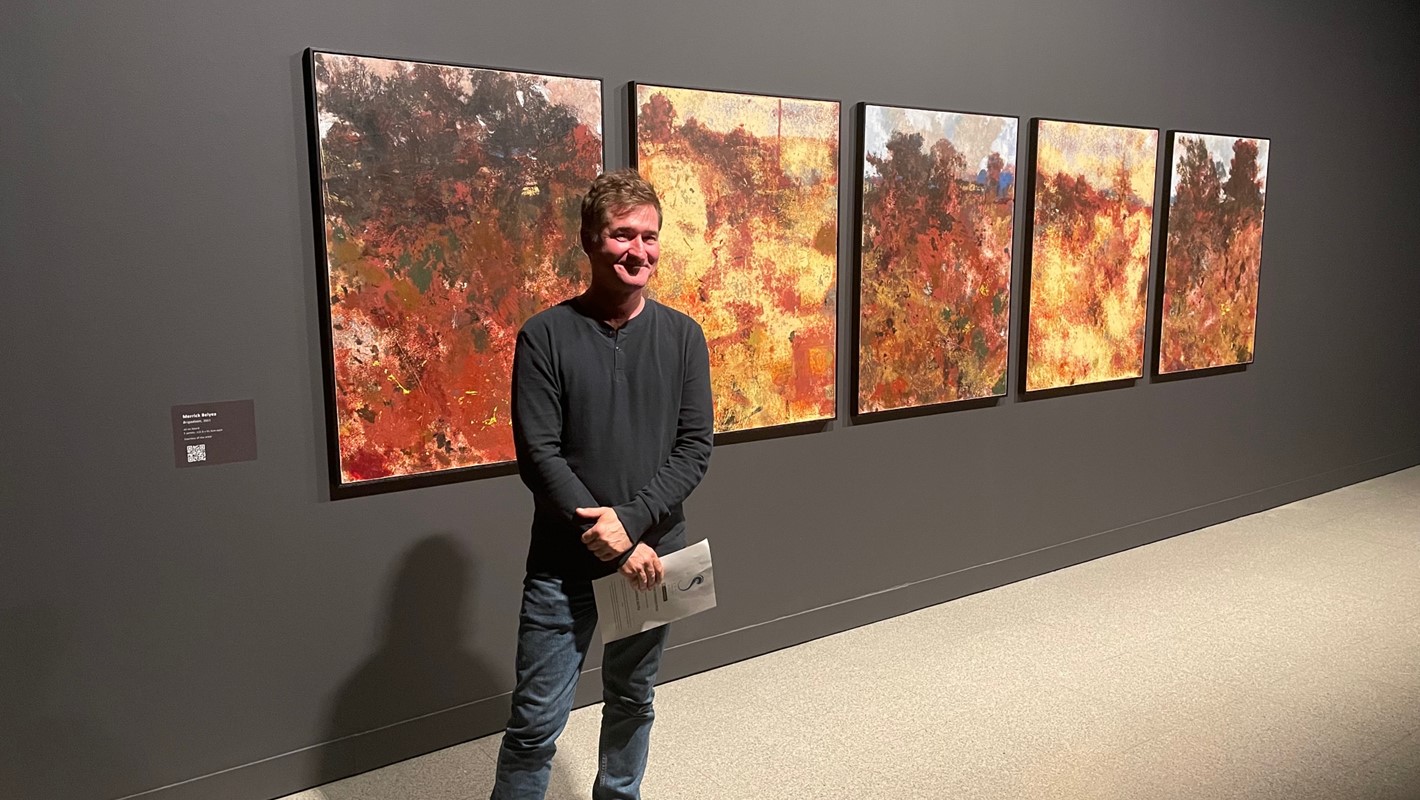 Merrick Belyea, winner of the 2021 John Stringer Prize, with his work Brigadoon, 2021, oil on board, 5 panels. Photo Hans Roux. 