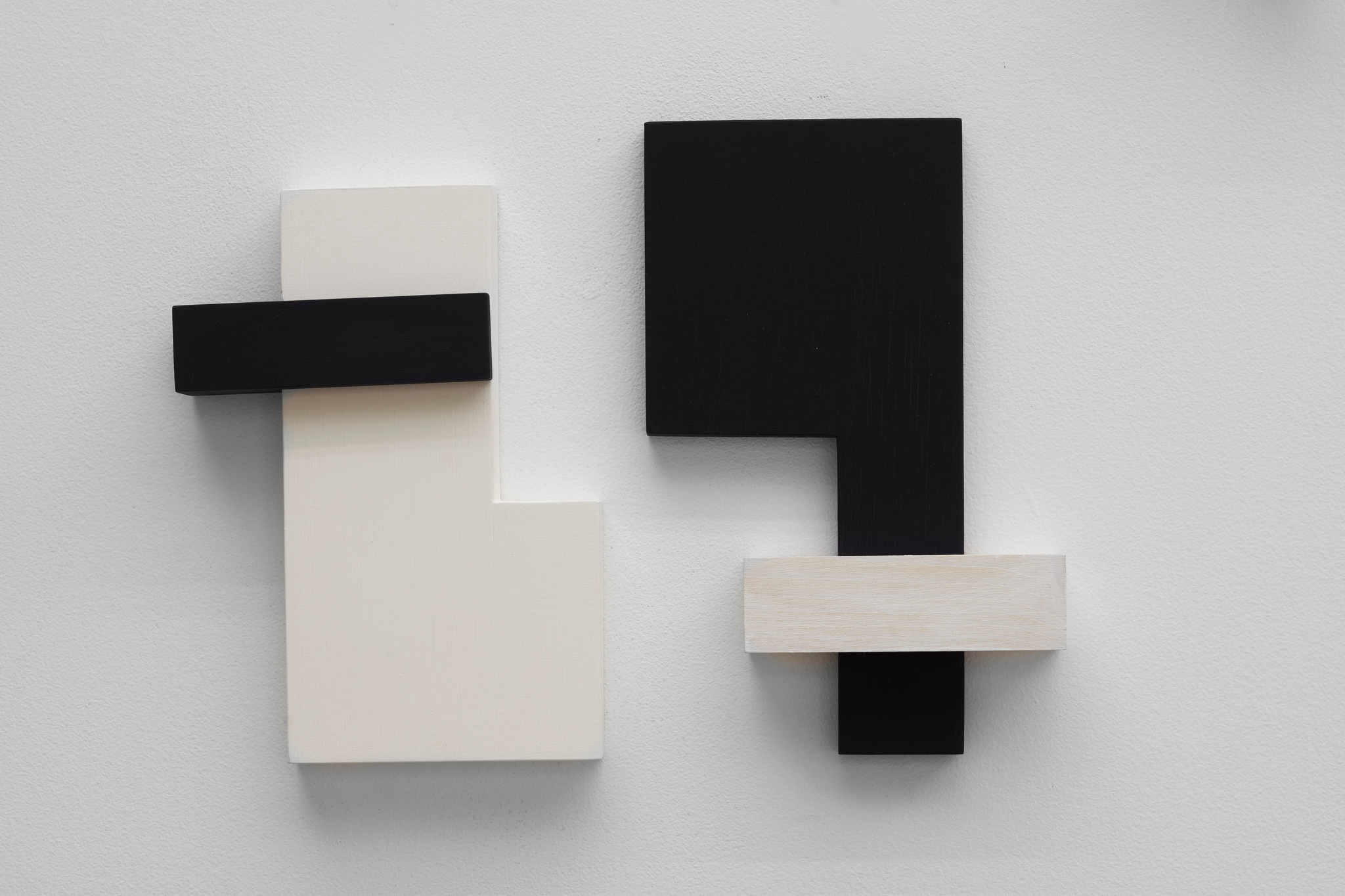 Theo Koning, It's Not Only Black and White 5, 2018, acrylic paint on wood, 27 x 20 x 4cm and It's Not Only Black and White 6, 2018, acrylic paint on wood, 30 x 20 x 4cm