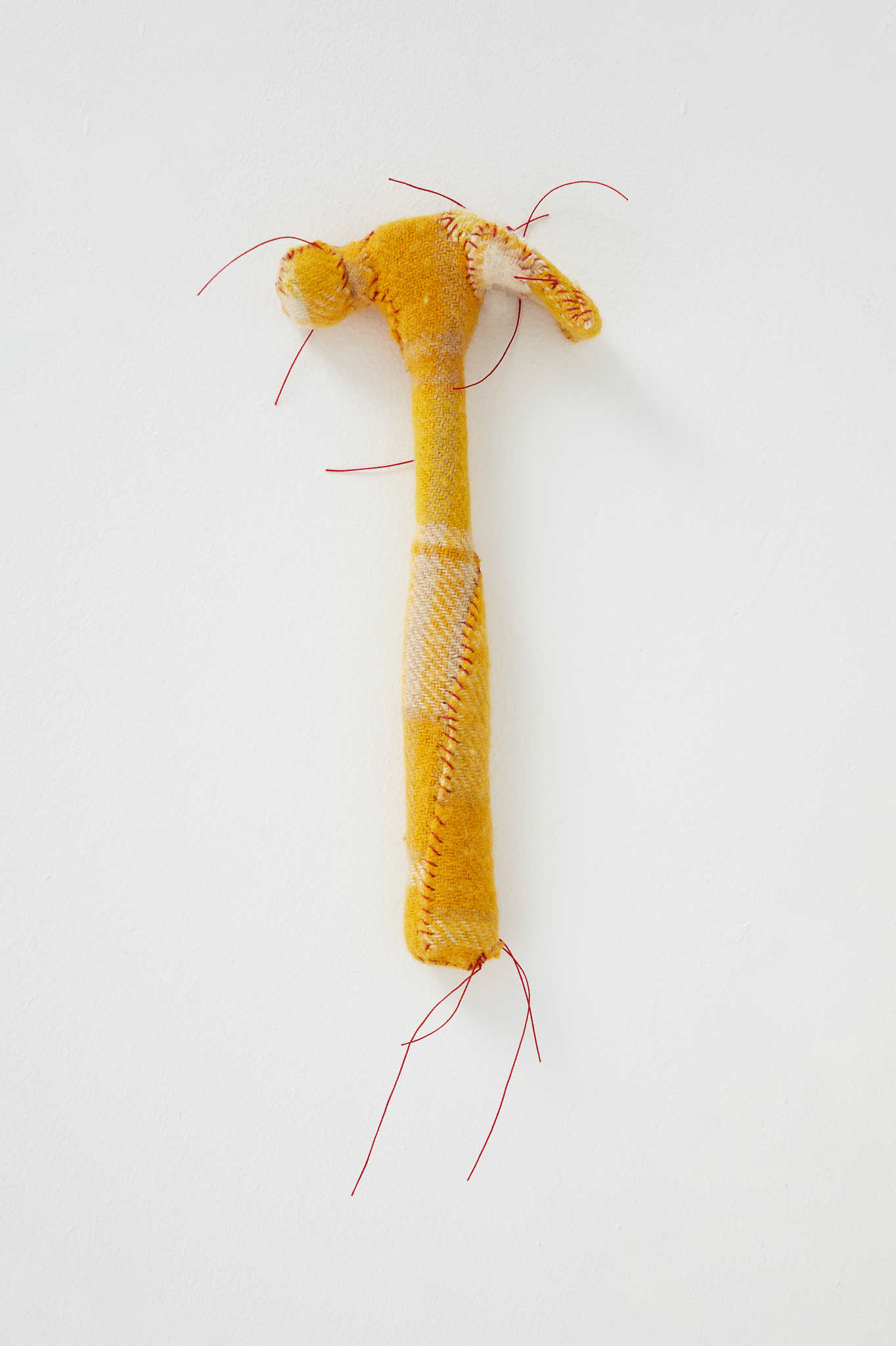 Olga Cironis, Hammer, 2022, repurposed tool, woollen blanket and cotton thread, 32 x 13 x 4cm
