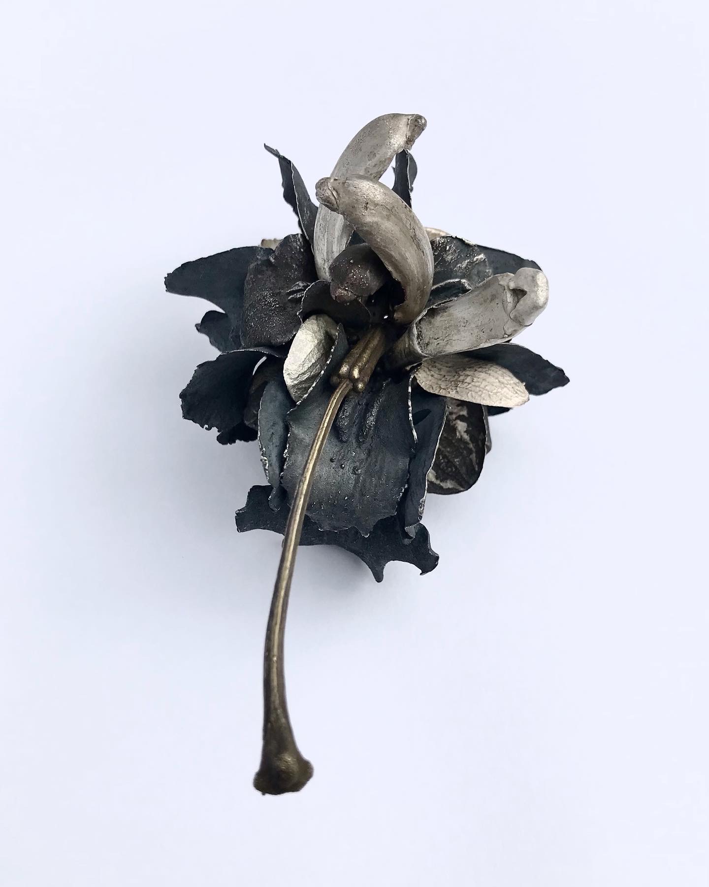 Sarah Elson, Fuck Cluster Brooch 4 (orchid parts and stamen), 2022, orchid parts, and stamen, recycled silver and and brass, 9 x 9 x 12.5cm