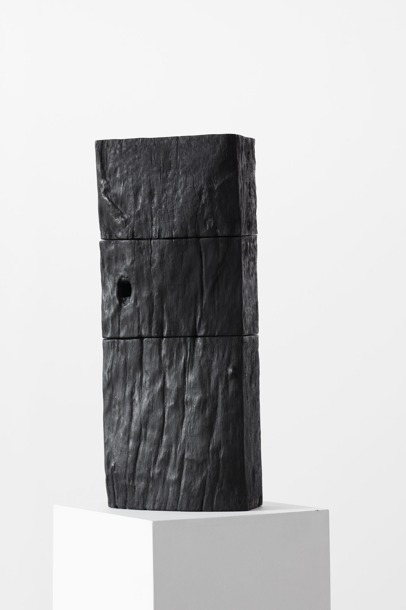 Jennifer Cochrane, Sleeper Self-Portrait #3, 2023, burnt jarrah and wax, 54.4 x 22 x 12cm