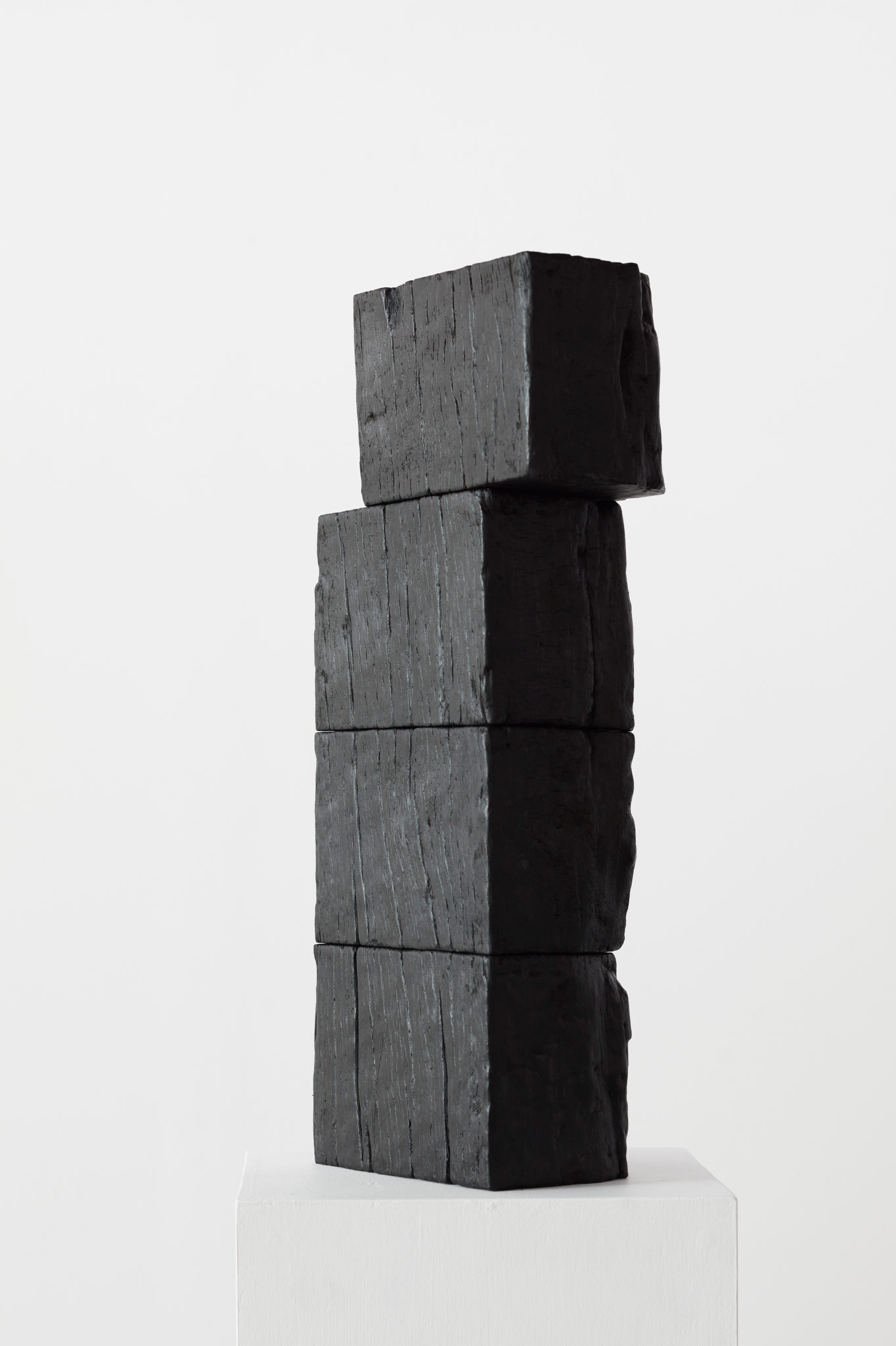 Jennifer Cochrane, Sleeper Self-Portrait #4, 2023, burnt jarrah and wax, 58 x 22 x 12cm