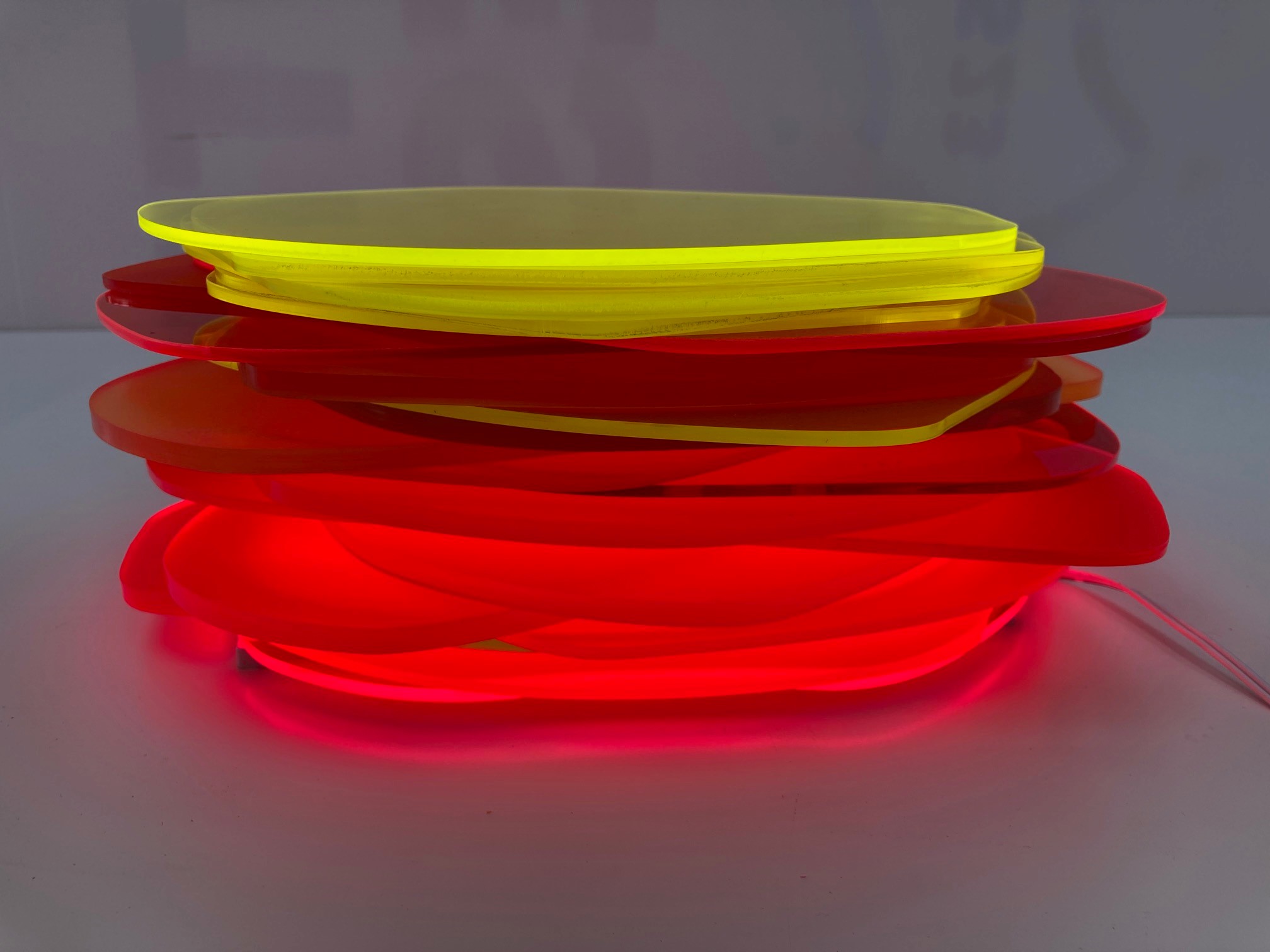 Pamela Gaunt, Fandango I (Illuminated Horizontal Stack), 2023, laser-cut and assembled Plexiglass and Perspex off-cuts from Not Quite Wabbly and vinyl tape, 11 x 25 x 25cm