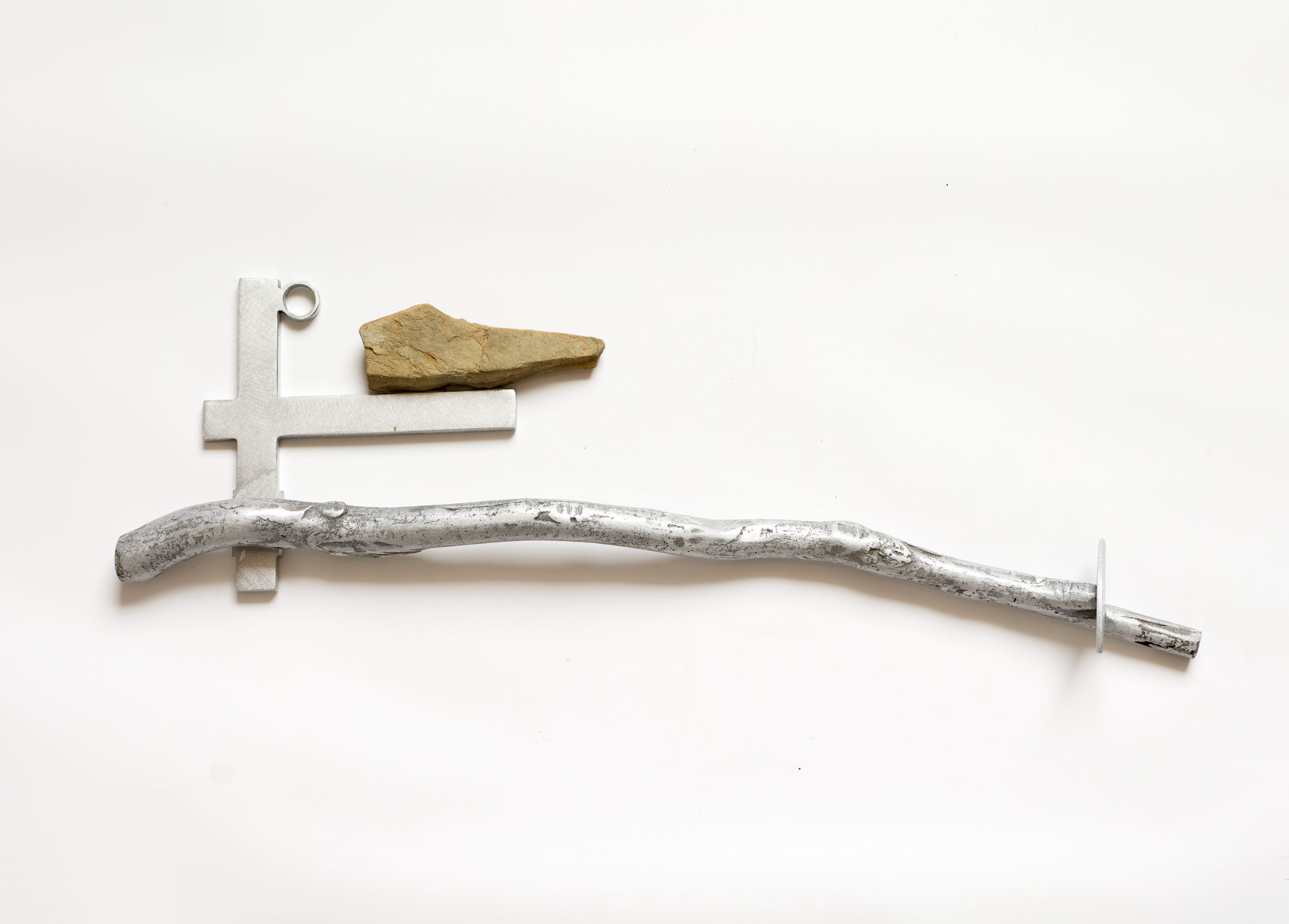 Anne Neil, Fragments of memories seemed to float in my mind, 2024, cast aluminium, aluminium plate and granite, 19.5 x 68 x 6cm