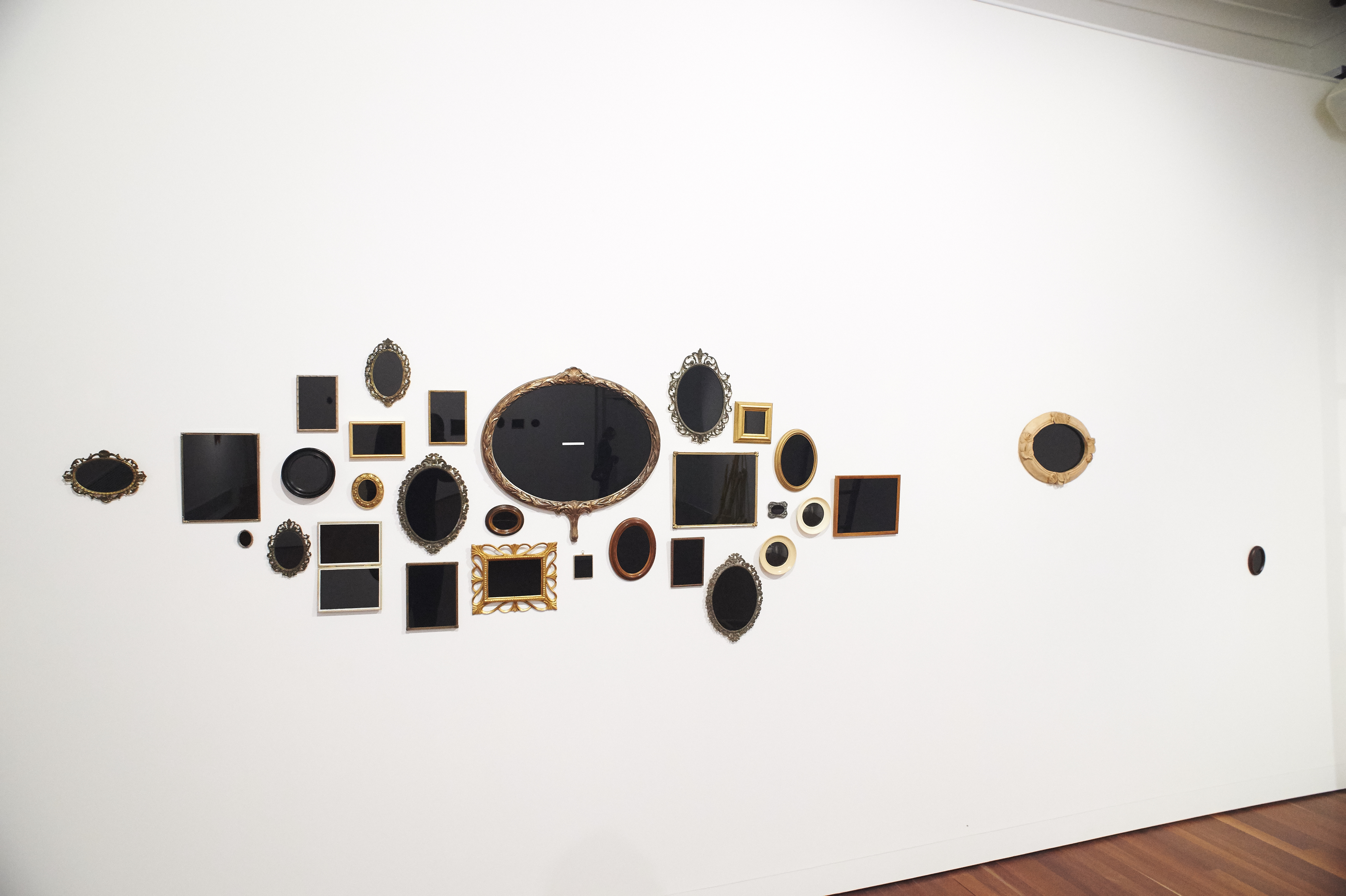 Olga Cironis, Horizon Amongst Chaos, 2022, repurposed frames and acrylic, varied dimensions, (30 pieces)