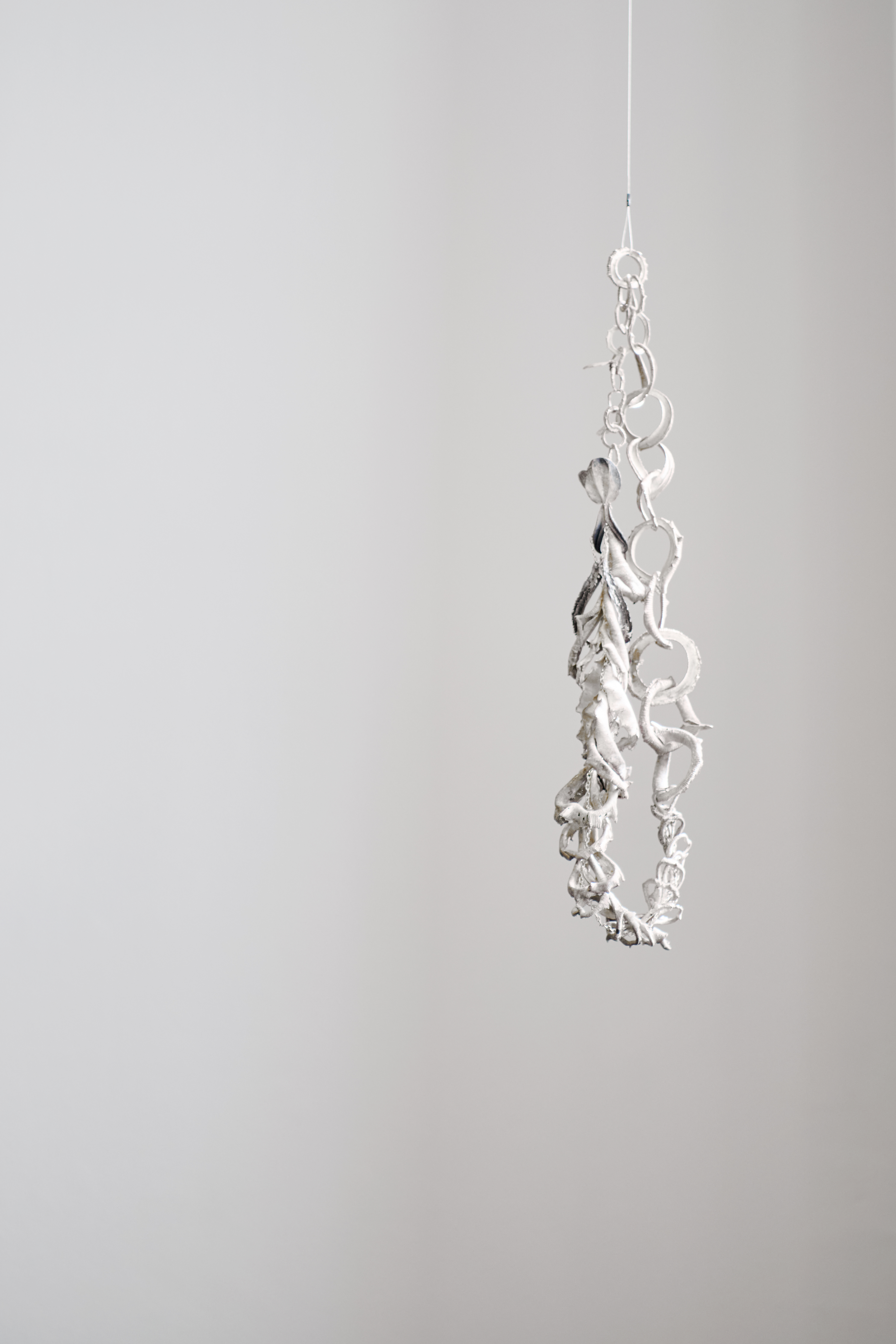 Sarah Elson, Allelopathic Chains, 2017-24, recycled silver, 65 x 12 x 8cm