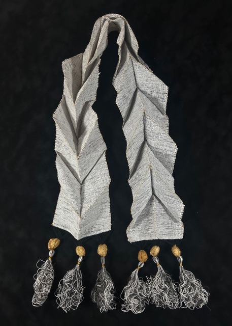 Jacky Cheng, Echo in the Fold, 2025, hand-rolled paper thread and gold leaf thread, sumi ink, wool, gold Cricula silk cocoons, natural silk dyed thread, 140 x 15 x 4cm