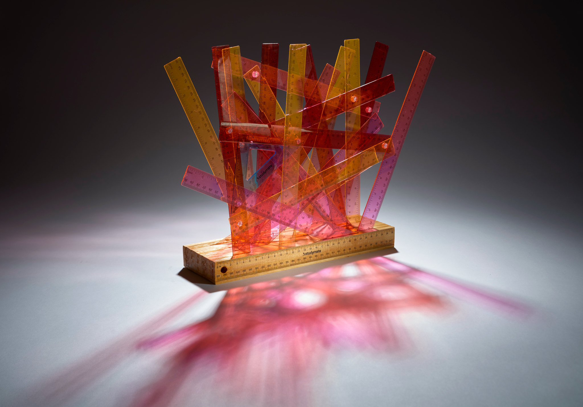 Minaxi May, Refracted Rhythms: Geometry in Colour, 2026, FSC wood and plastic rulers, dimensions variable