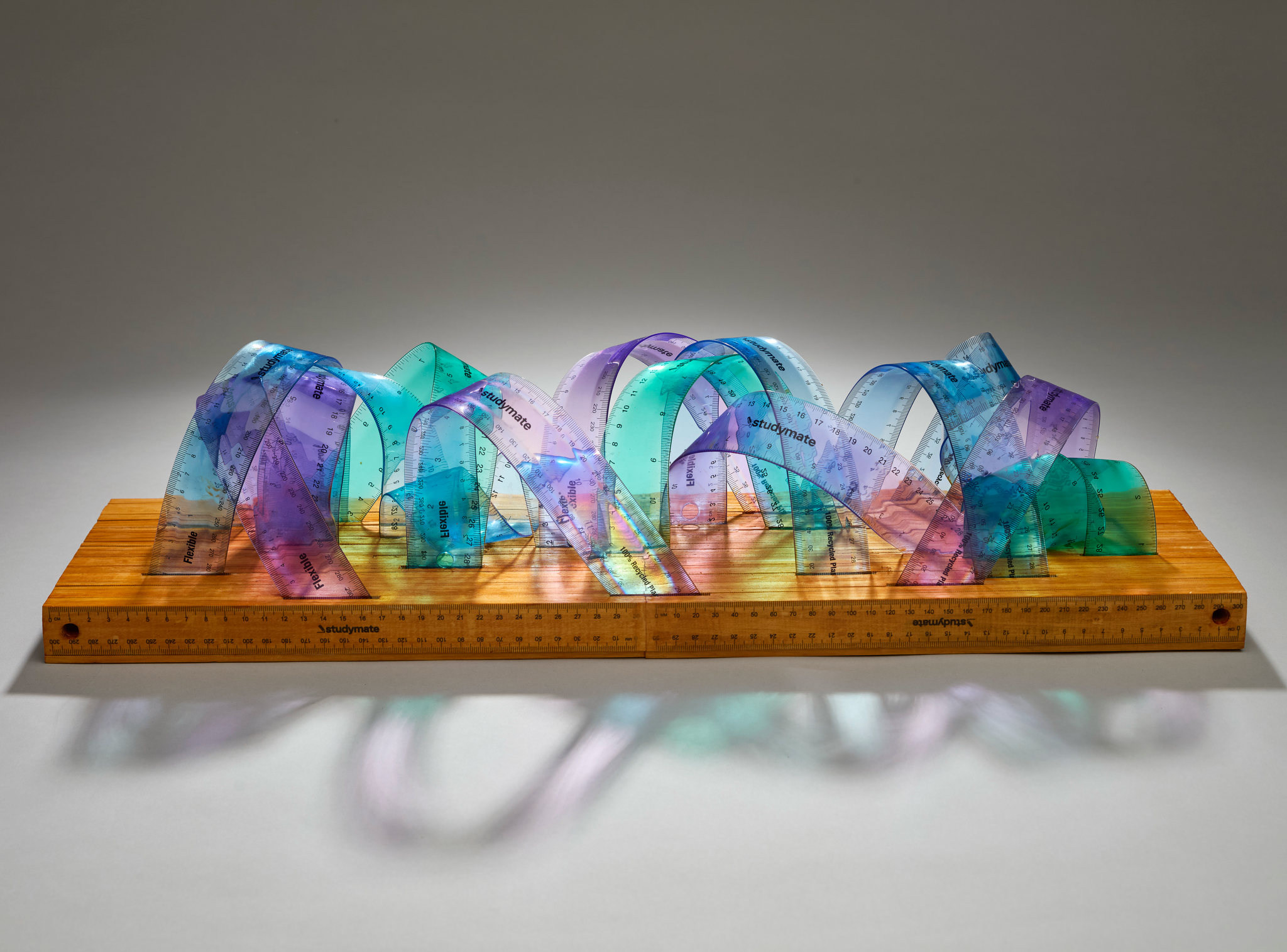 Minaxy May, Wavy Wurly, 2026, wood and plastic, 15 × 62 × 16.5cm