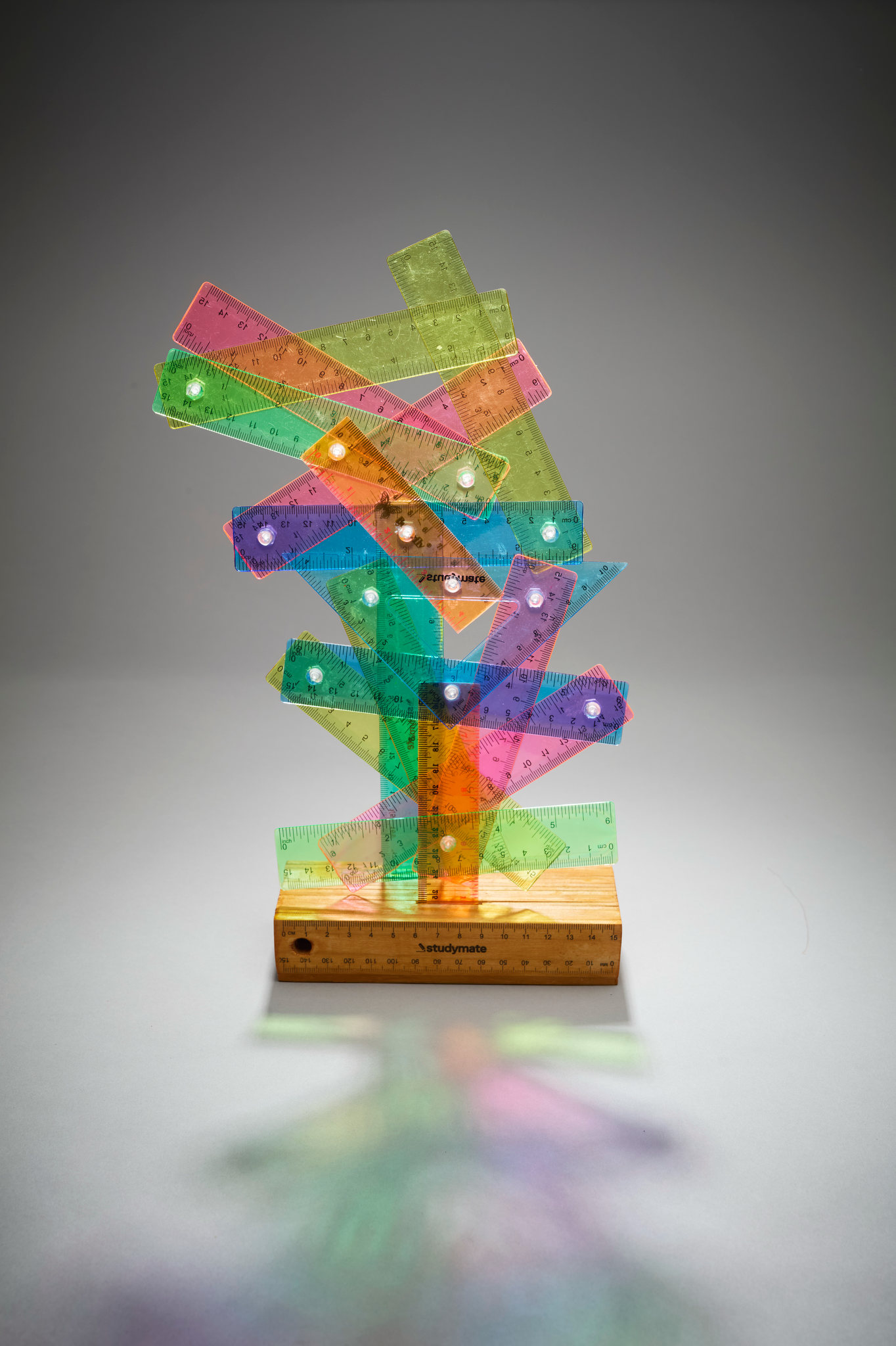Minaxy May, Criss-Crossed, 2026, plastic rulers and wood, 33.5 x 21 x 7cm